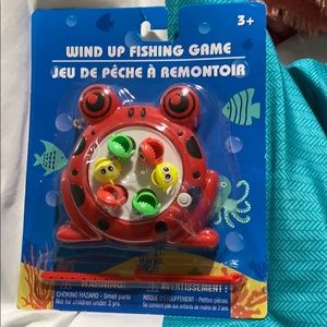 Wind up fishing game